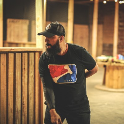 a man standing in front of a building