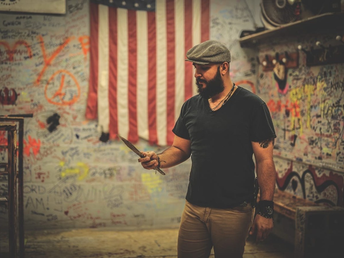 a man standing in front of a store